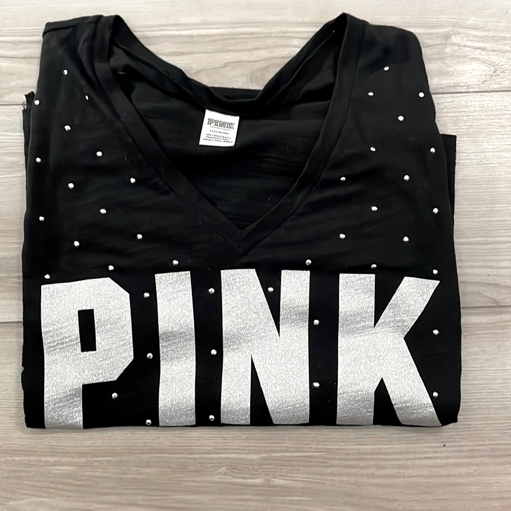 Another T-shirt with some bling. All sequences are still there. No stains/ tears